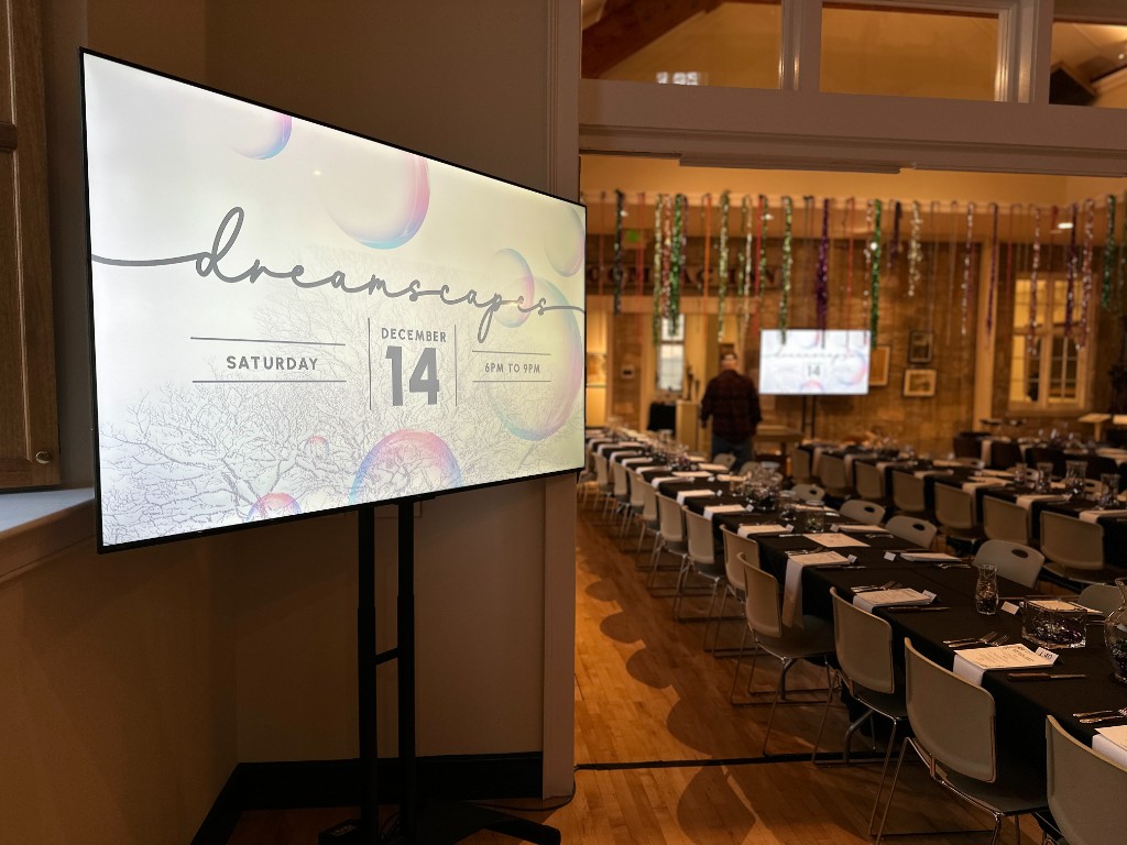 The Dreamscapes title card on a 75-inch at Bennington Museum.
