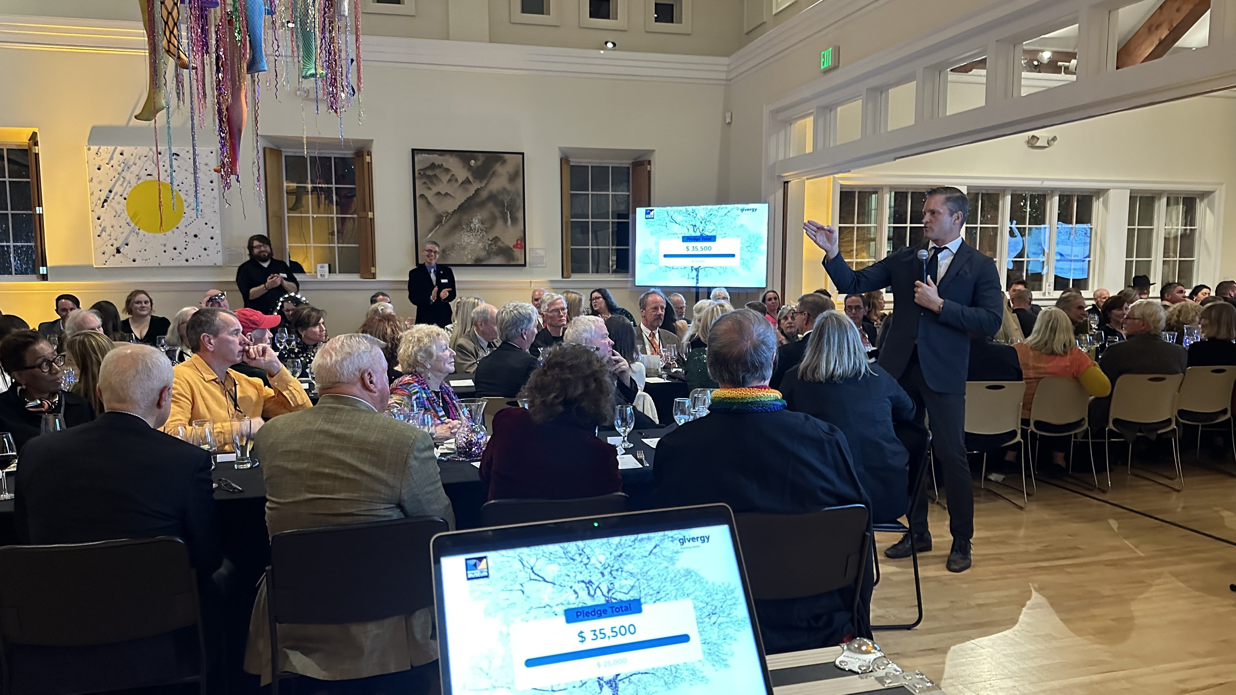 Silent auction and video display at the Bennington Museum fundraising gala.