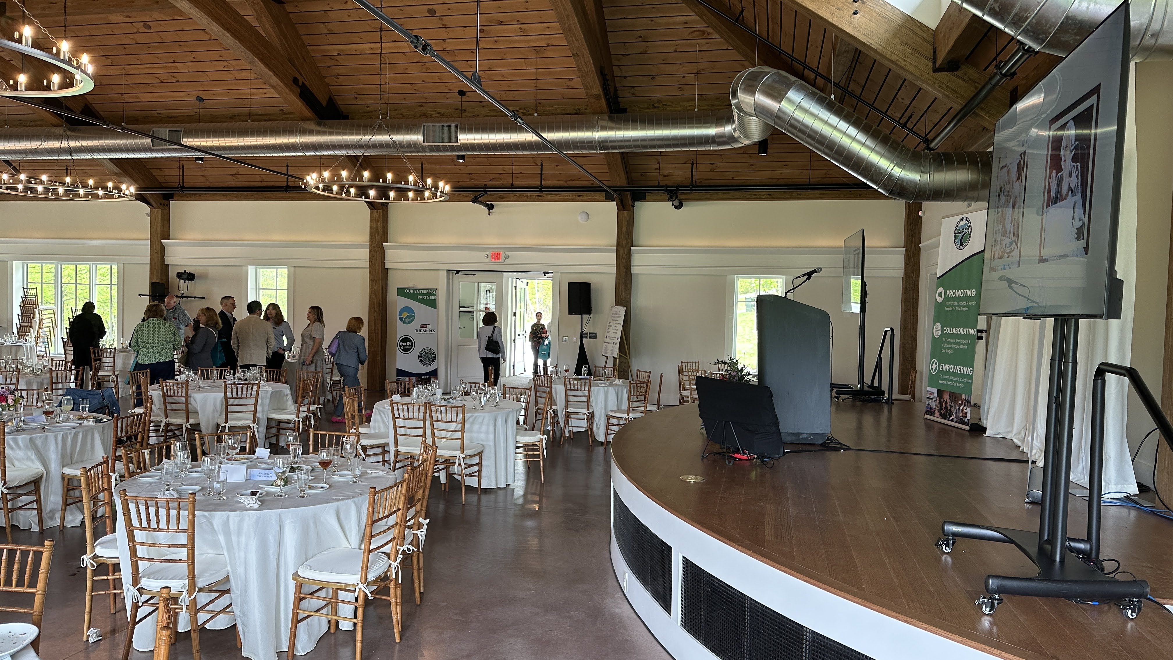 Attendees networking and celebrating women leaders at Hildene.